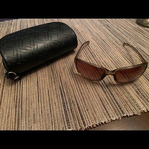 Oakley brown sunglasses.